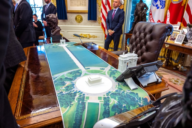A plan for an arch across from the Lincoln Memorial is seen on the Resolute Desk as US President Donald Trump meets with Finnish President Alexander Stubb and Prime Minister Petteri Orpo in the Oval Office of the White House in Washington, DC, on Oct. 9, 2025.