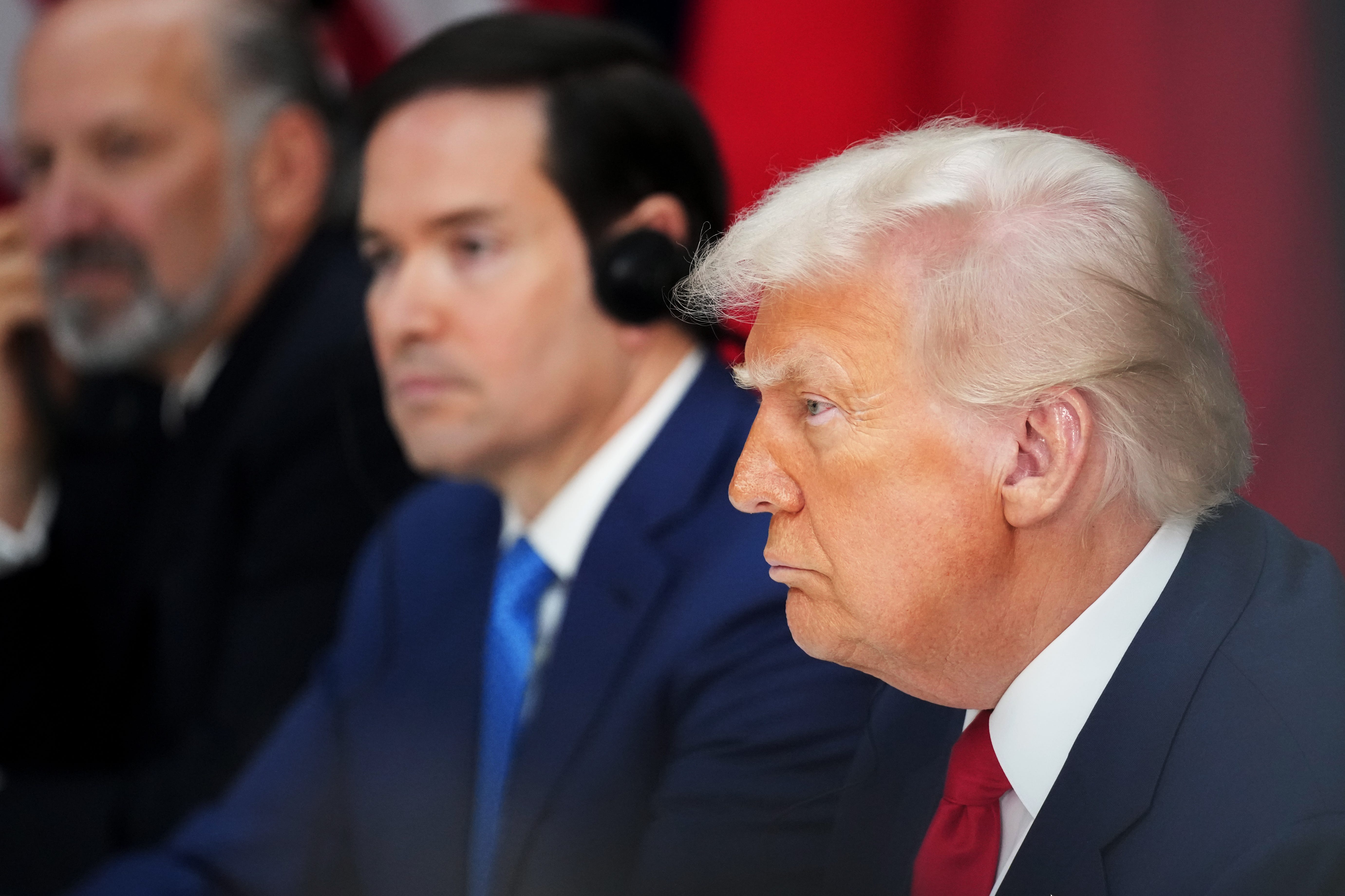 Donald Trump listens during a bilateral meeting in South Korea.