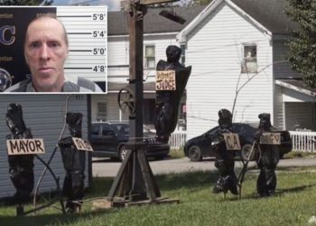 Twisted Halloween display shows local officials in body bags