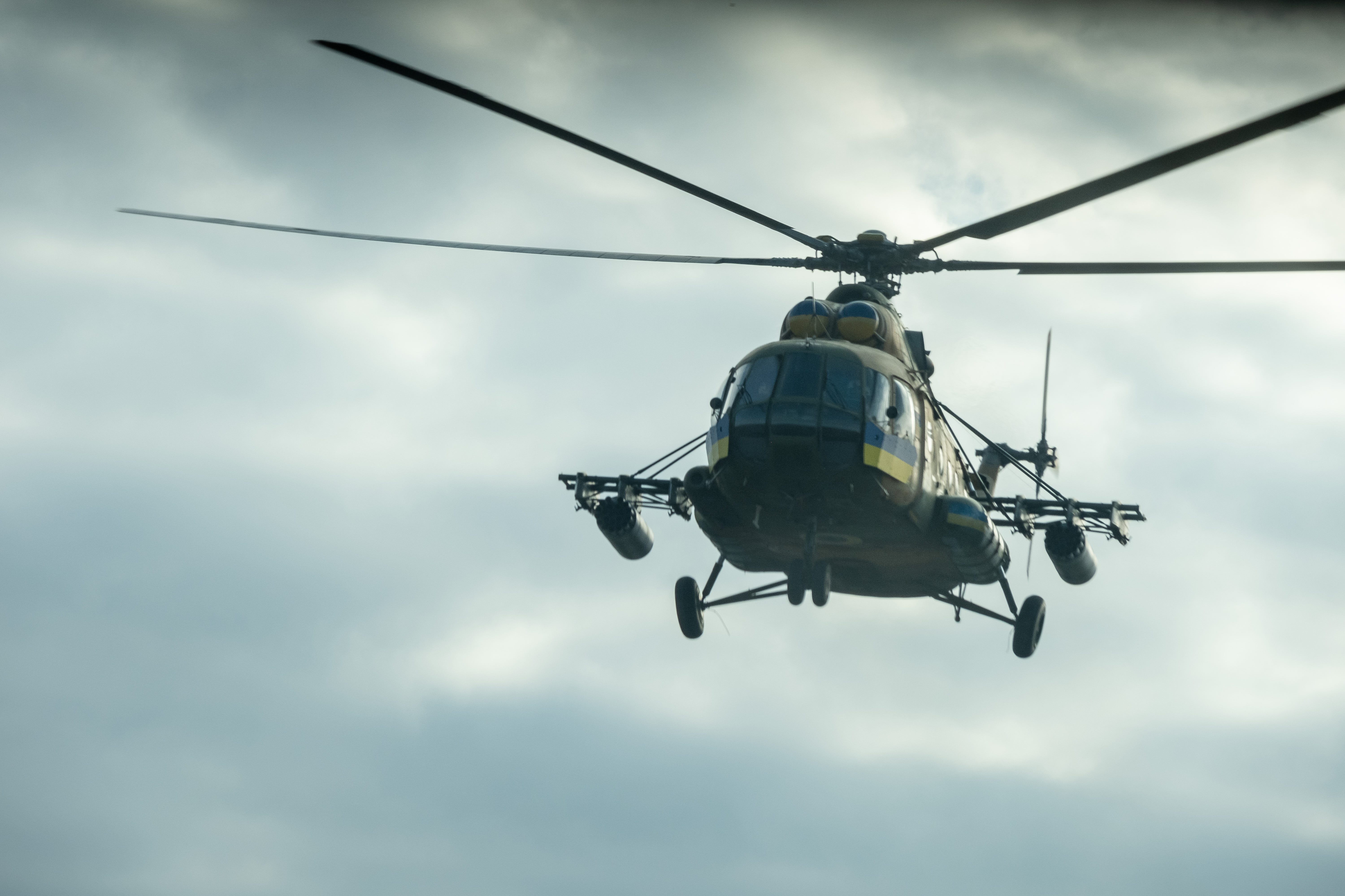A low-flying Ukrainian military helicopter using the roads for navigation in the Dnipropetrovsk Oblast Region.