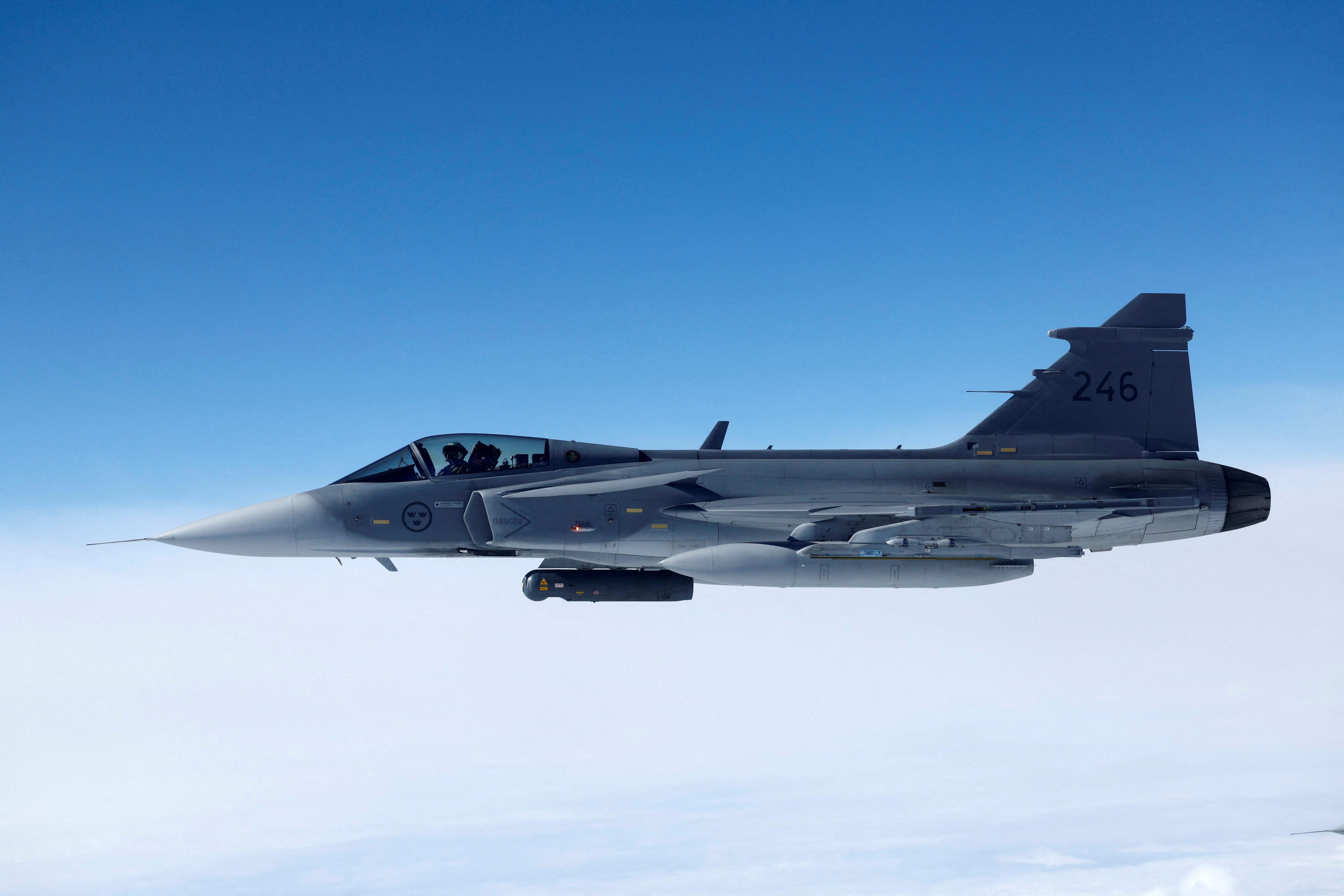 FILE PHOTO: A Swedish Air Force Saab JAS 39 Gripen fighter jet flies during a media day, illustrating how NATO Air Policing safeguards the Allies' airspace in the northern and northeastern region of the Alliance, July 4, 2023.