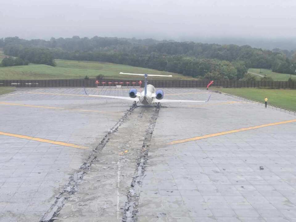 The CommuteAir plane on the EMAS stopped.