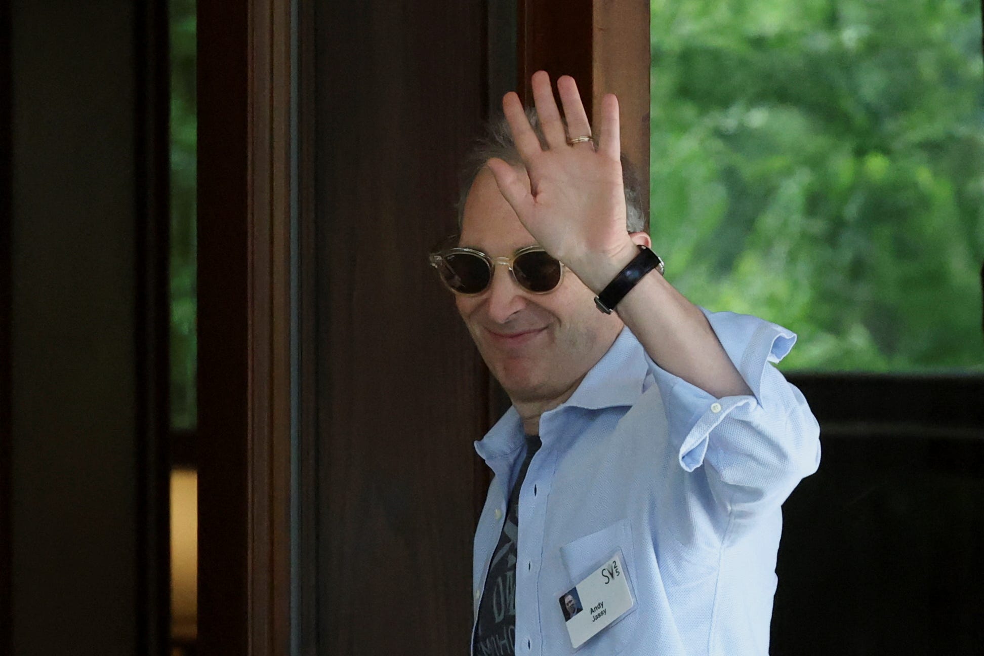 Amazon CEO Andy Jassy waving from Allen & Co.'s Sun Valley tech conference