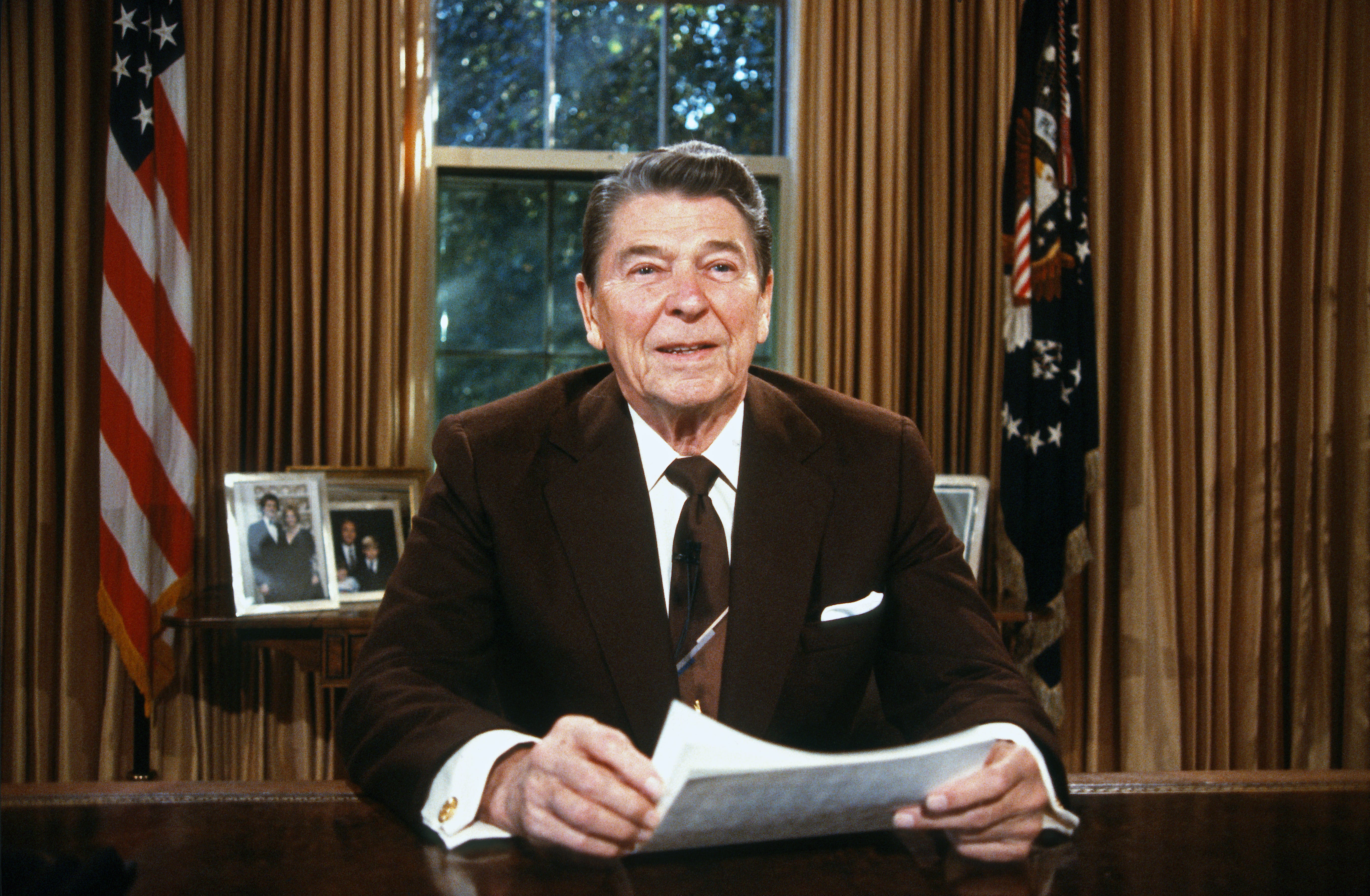 Former US President Ronald Reagan in White House's Oval Office, Washington, DC, on October 14, 1987.