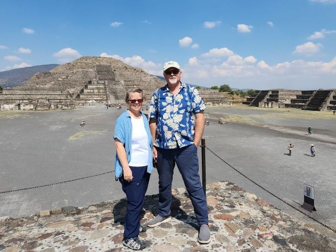 The Mayerniks in front of pyramids in Mexico.