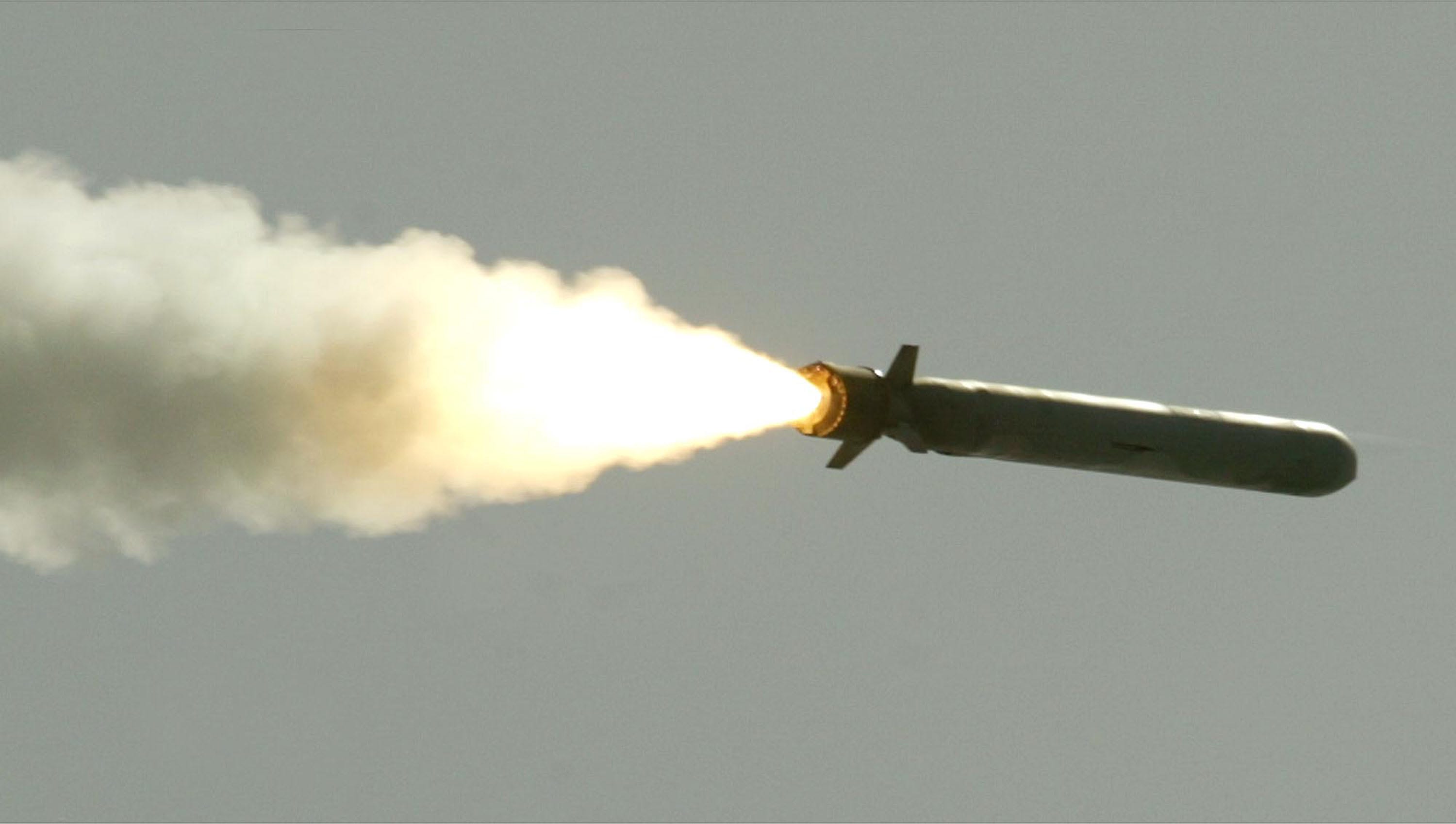 A Tomahawk cruise missile flies toward Iraq after being launched from the AEGIS guided missile cruiser USS San Jacinto March 25, 2003 in the Red Sea.