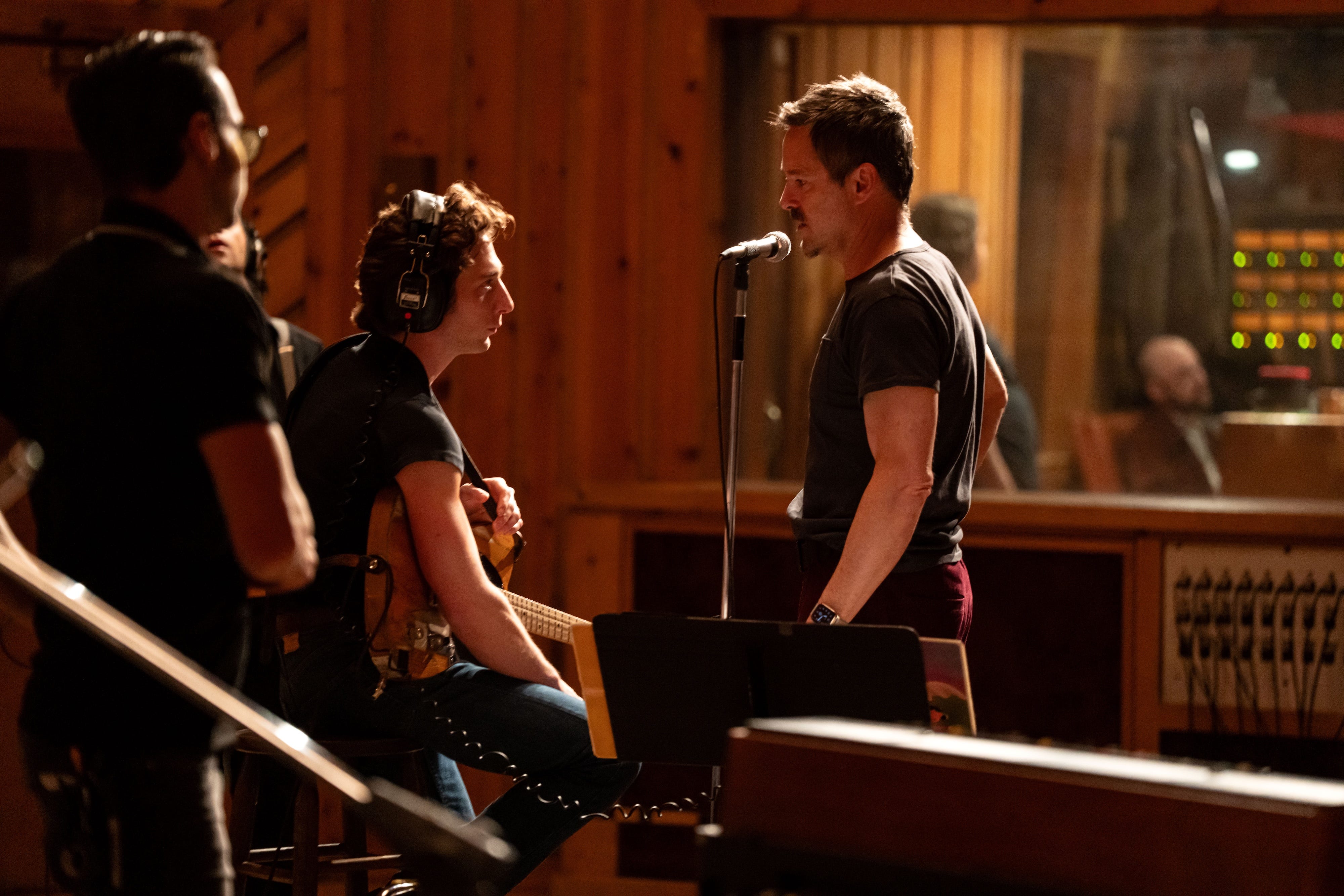 Jeremy Allen White and Scott Scooper on the set of 