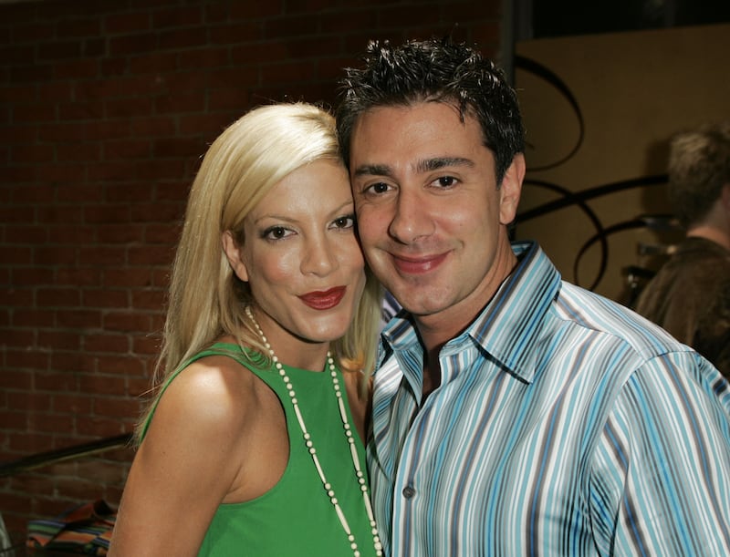 Tori Spelling and Charlie Shanian during Ted Baker London Best In Show Store Opening - Red Carpet Arrivals & Inside at Ted Baker Store in Los Angeles, California, United States 2005.