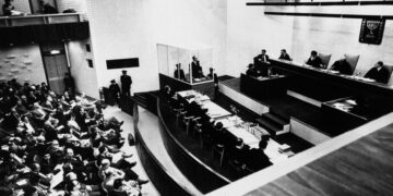 At Last, a Name for the Murderous Face in a Holocaust Photo