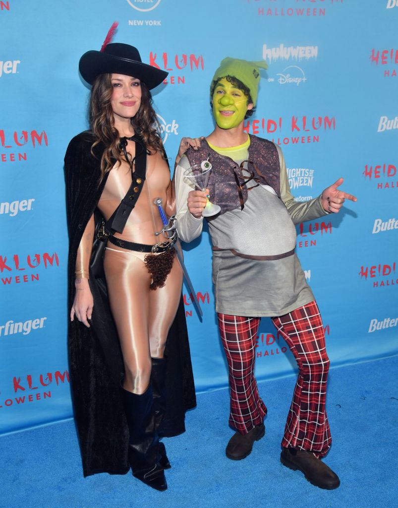Mia Swier and Darren Criss attend Heidi Klum's 24th Annual Halloween Party