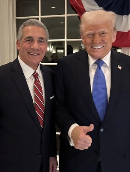 Donald Trump giving a thumbs-up gesture next to Jack Ciattarelli.
