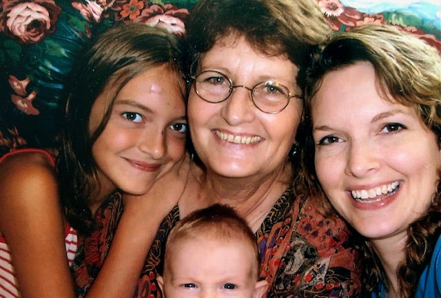 The author and her mother in 2004 with two of the author's daughters.