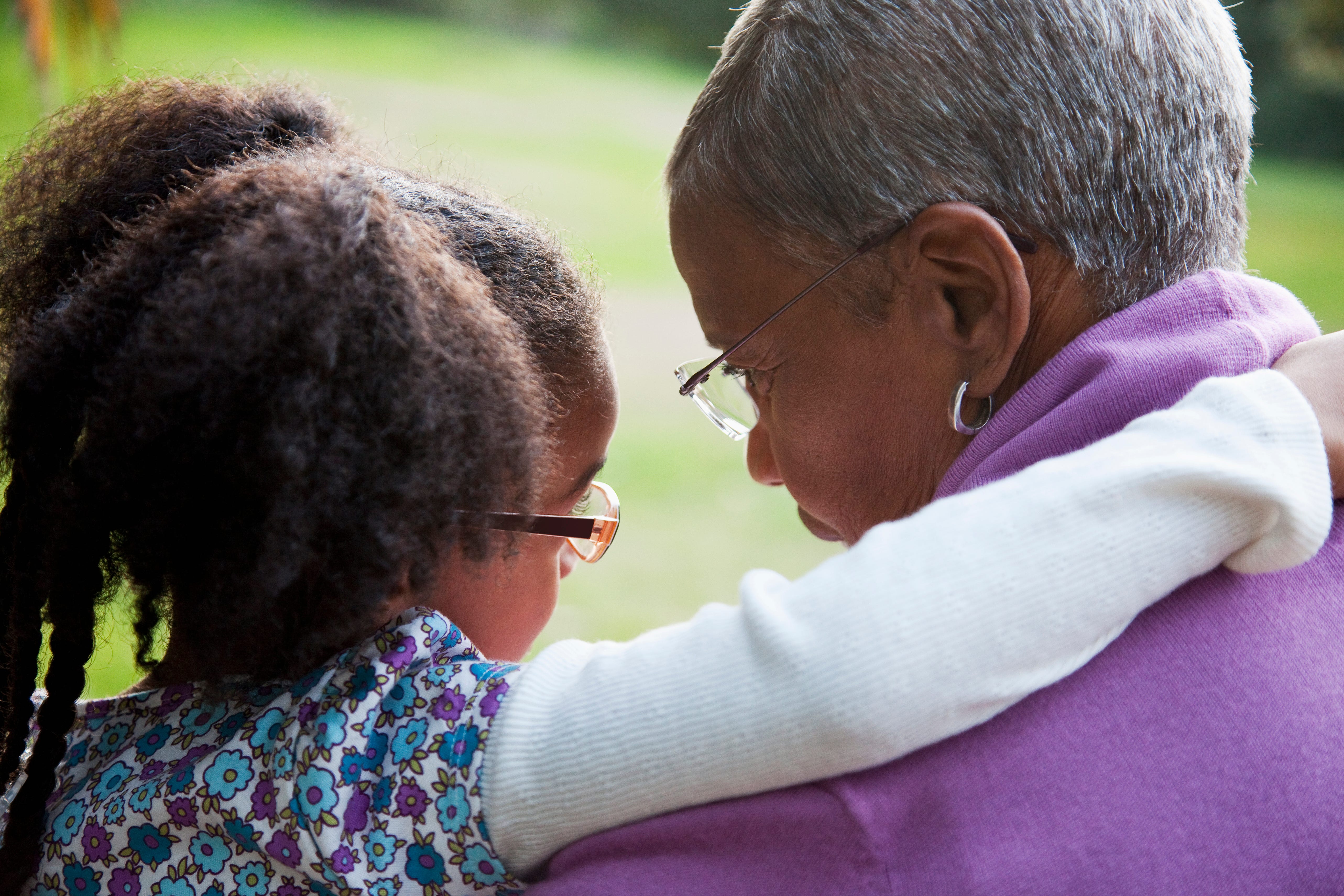A close-up of a grandmother and granddaughter spending time together.