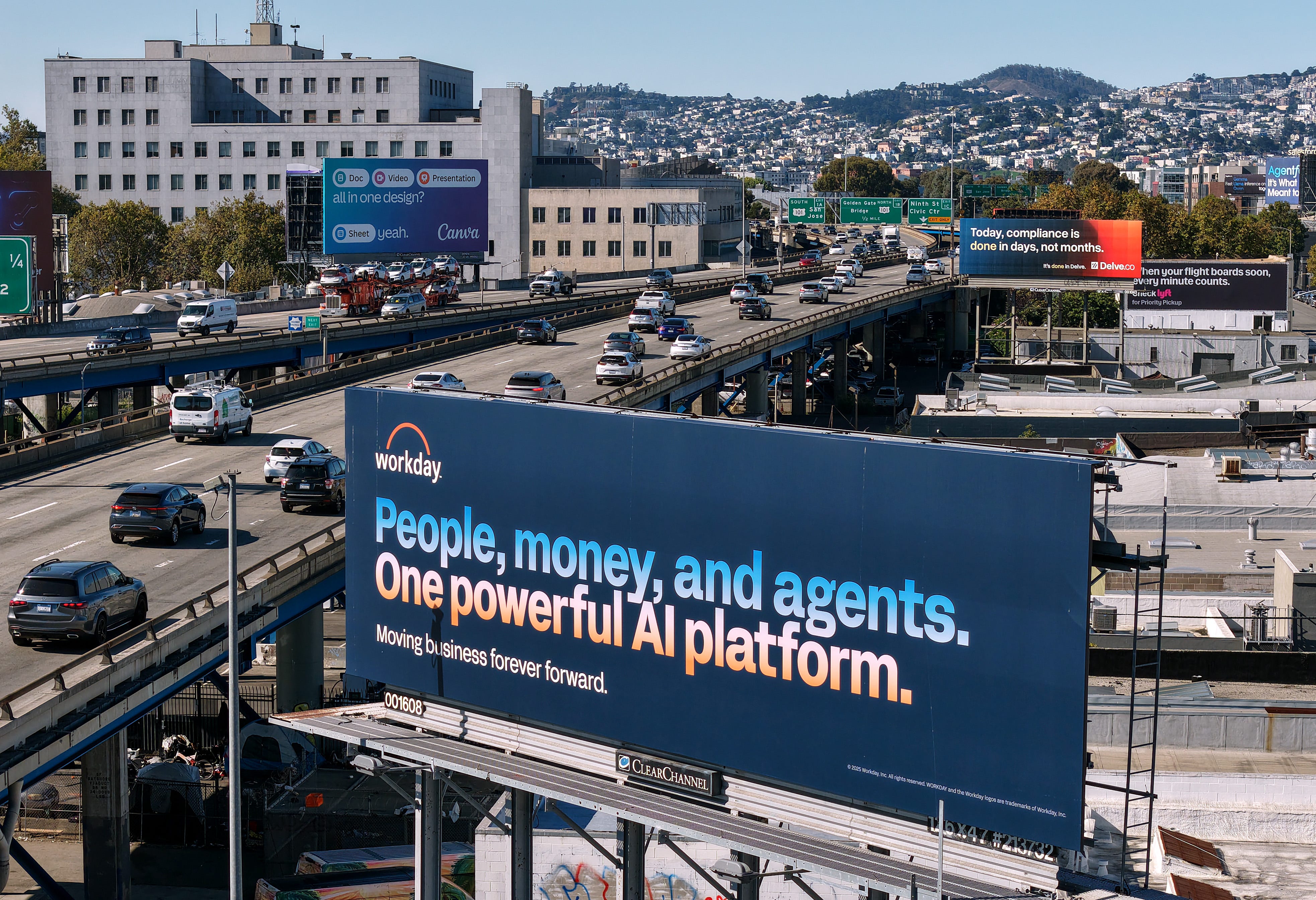 SAN FRANCISCO, CALIFORNIA - SEPTEMBER 16: In an aerial view, a billboard advertising an artificial intelligence (AI) company is posted on September 16, 2025 in San Francisco, California. As AI companies open offices in San Francisco, billboards advertising AI companies are appearing throughout the city and along Interstate 80. (Photo by Justin Sullivan/Getty Images)