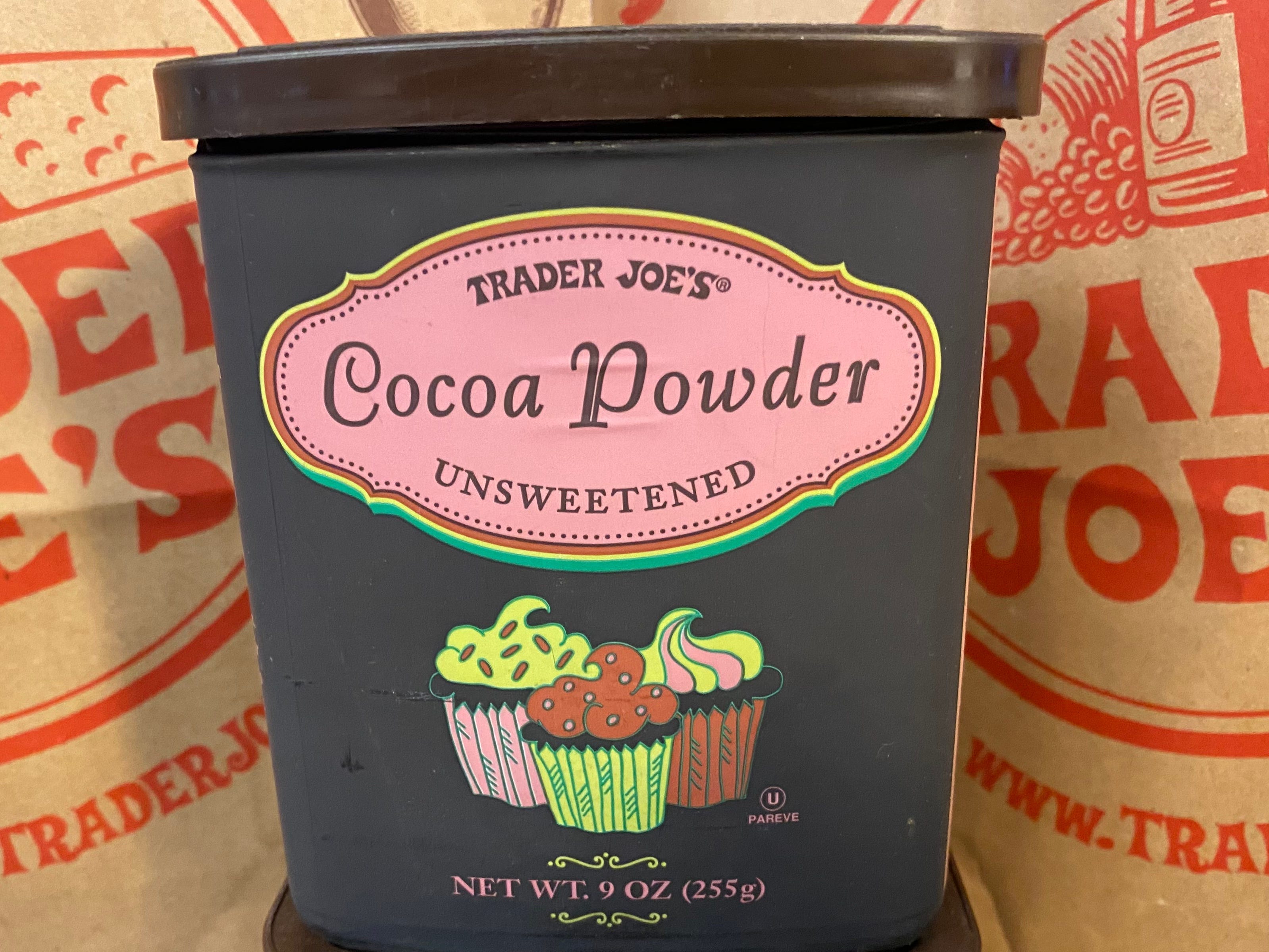 A container of Trader Joe's unsweetened cocoa powder.