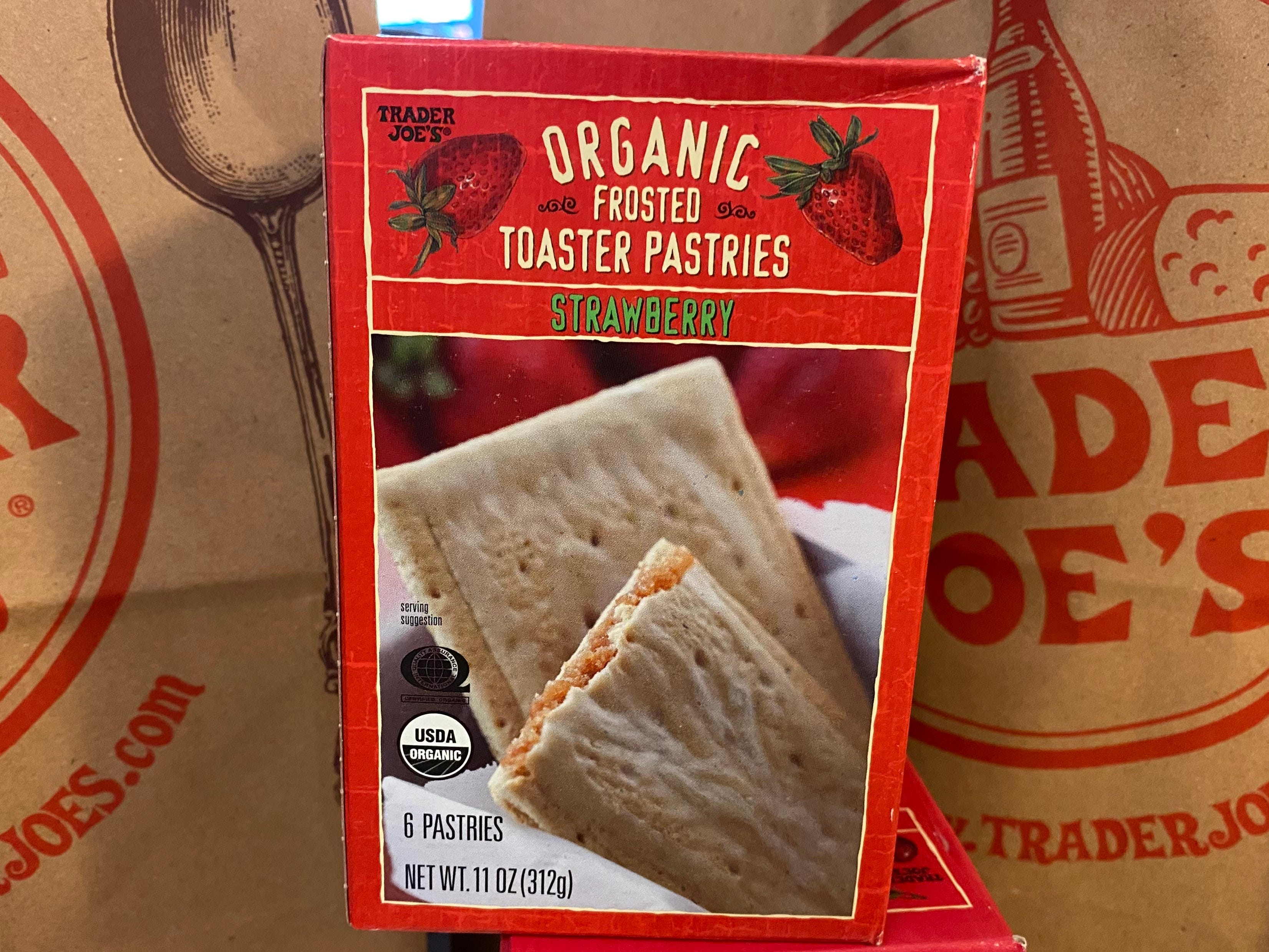 A box of Trader Joe's organic strawberry frosted toasted pastries.