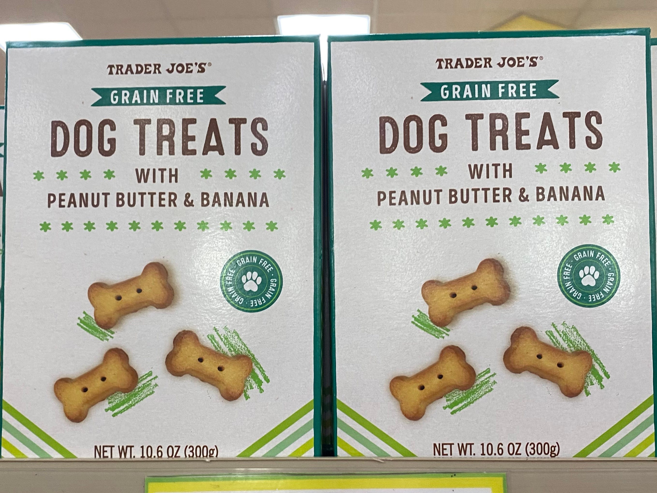 Two boxes of Trader Joe's grain-free dog treats with peanut butter and banana.