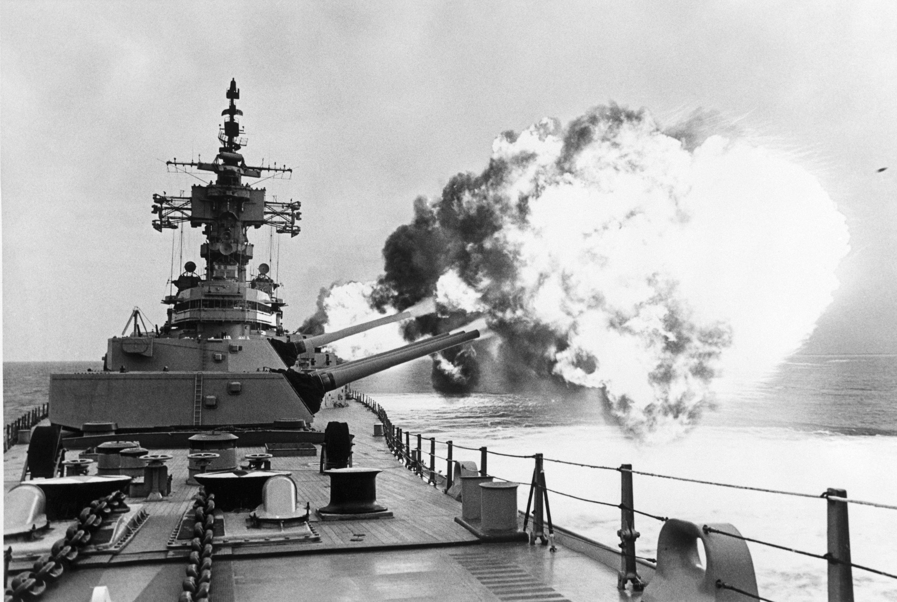 The USS New Jersey fires its guns during the Vietnam War.