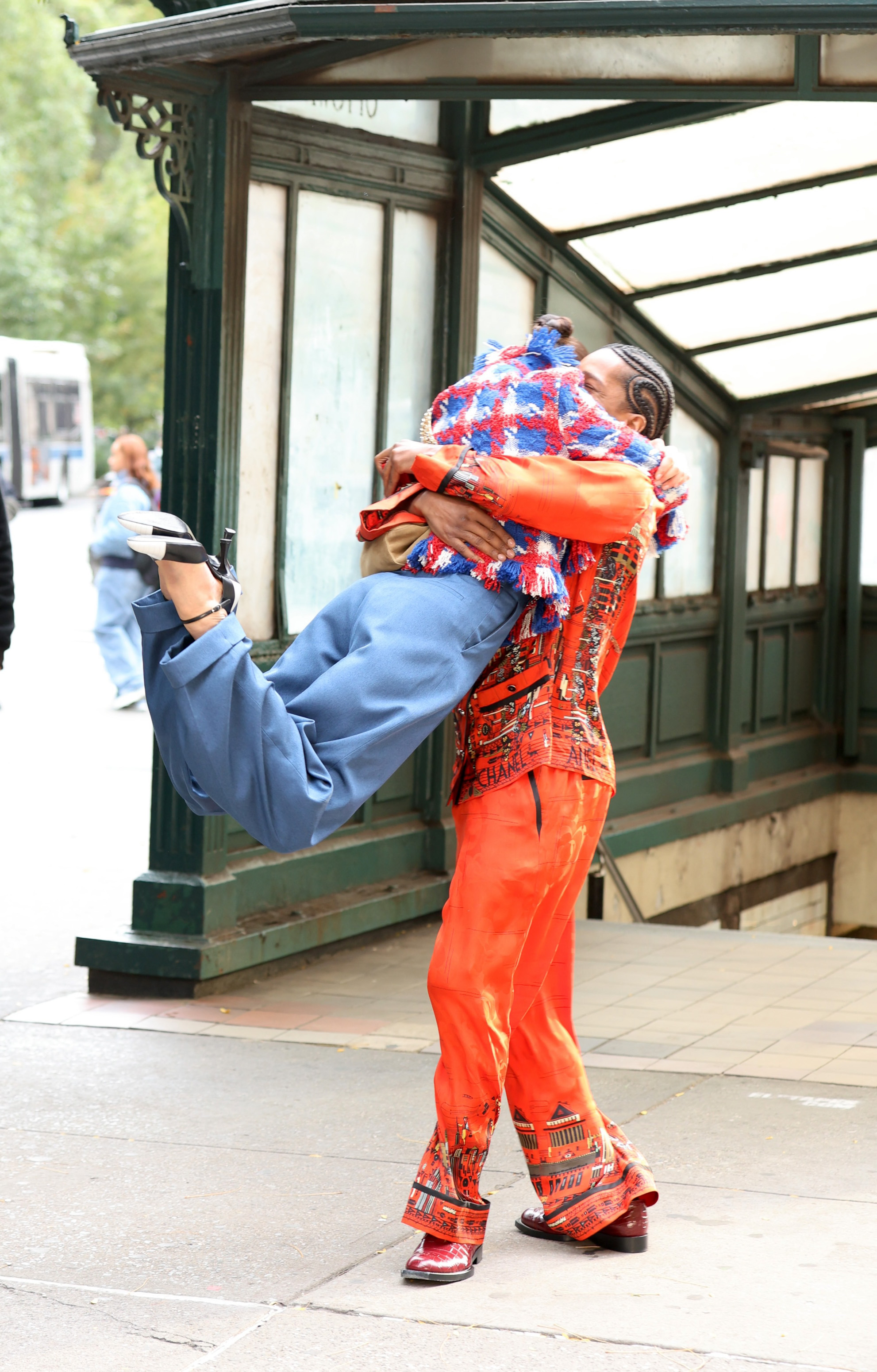Margaret Qualley gets a lift from A$AP Rocky as they shoot a Chanel ad on Astor Place.