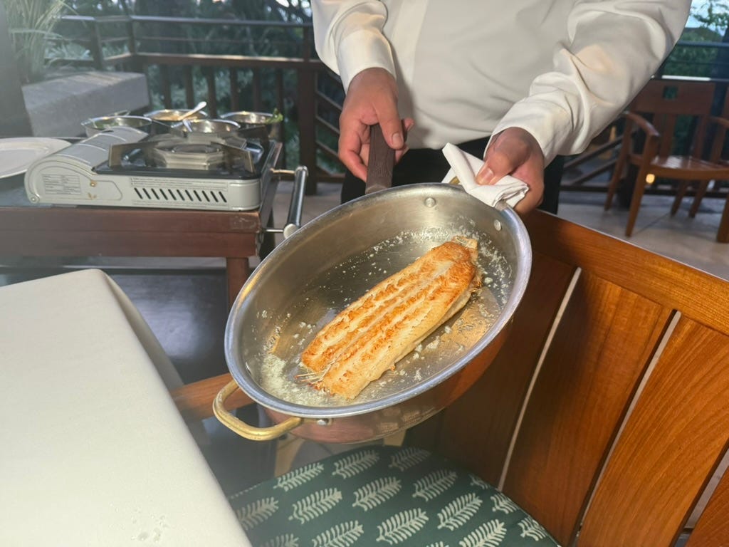 Food being prepared in large metal bowl