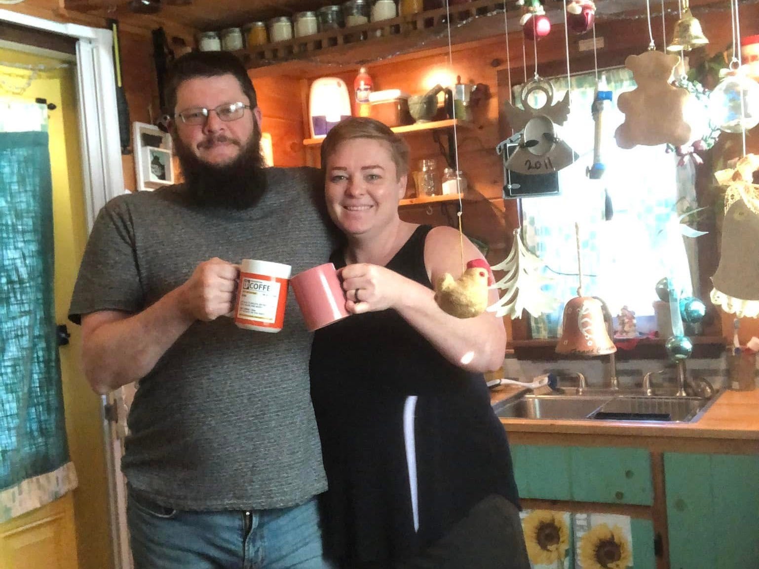 A couple celebrating the holidays in their tiny home