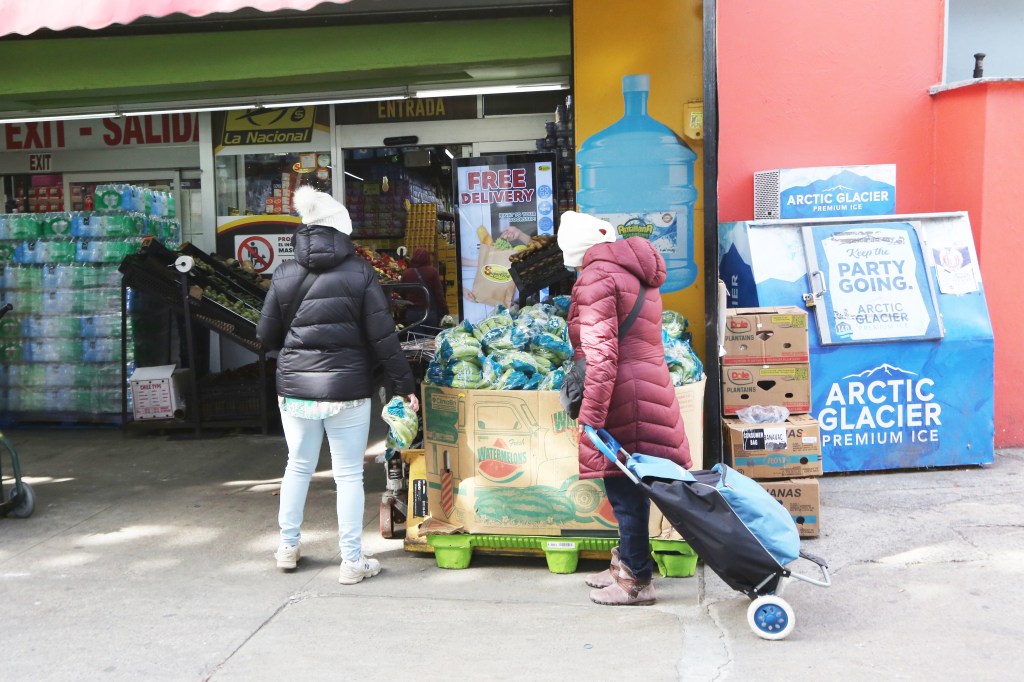 People shopping at a grocery store.