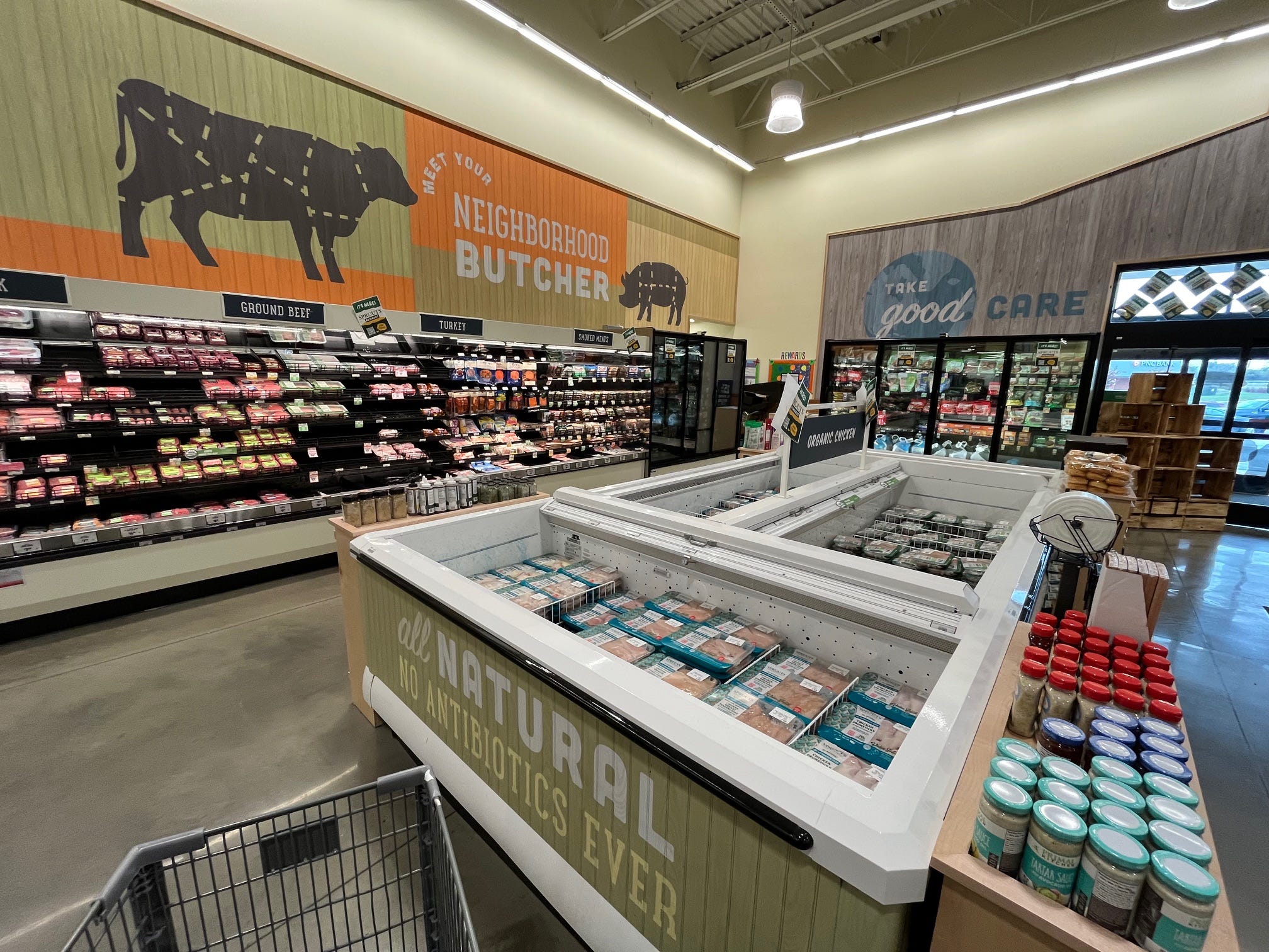 A sign above the meat section at Sprouts reads