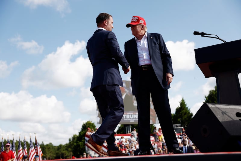 CHESAPEAKE, VIRGINIA - JUNE 28: Virginia Attorney General Jason Miyares joins Republican presidential candidate, former U.S. President Donald Trump onstage during a rally at Greenbrier Farms on June 28, 2024 in Chesapeake, Virginia. Last night Trump and U.S. President Joe Biden took part in the first presidential debate of the 2024 campaign. (Photo by Anna Moneymaker/Getty Images)