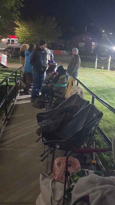 People wait in line to get into the trial of Richard Allen.