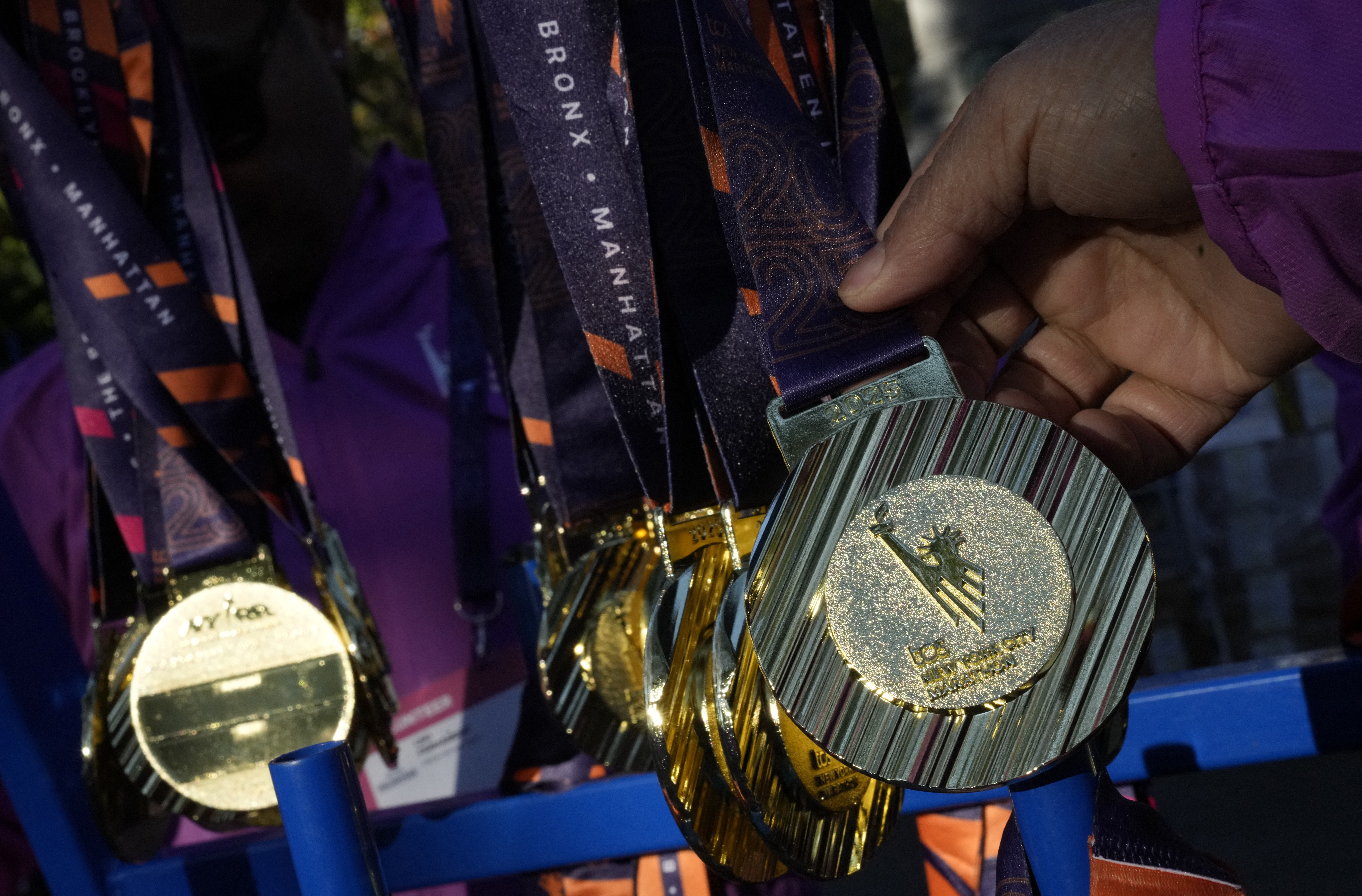 Medals are seen on the finish line in Central Park in Manhattan before the marathon 
