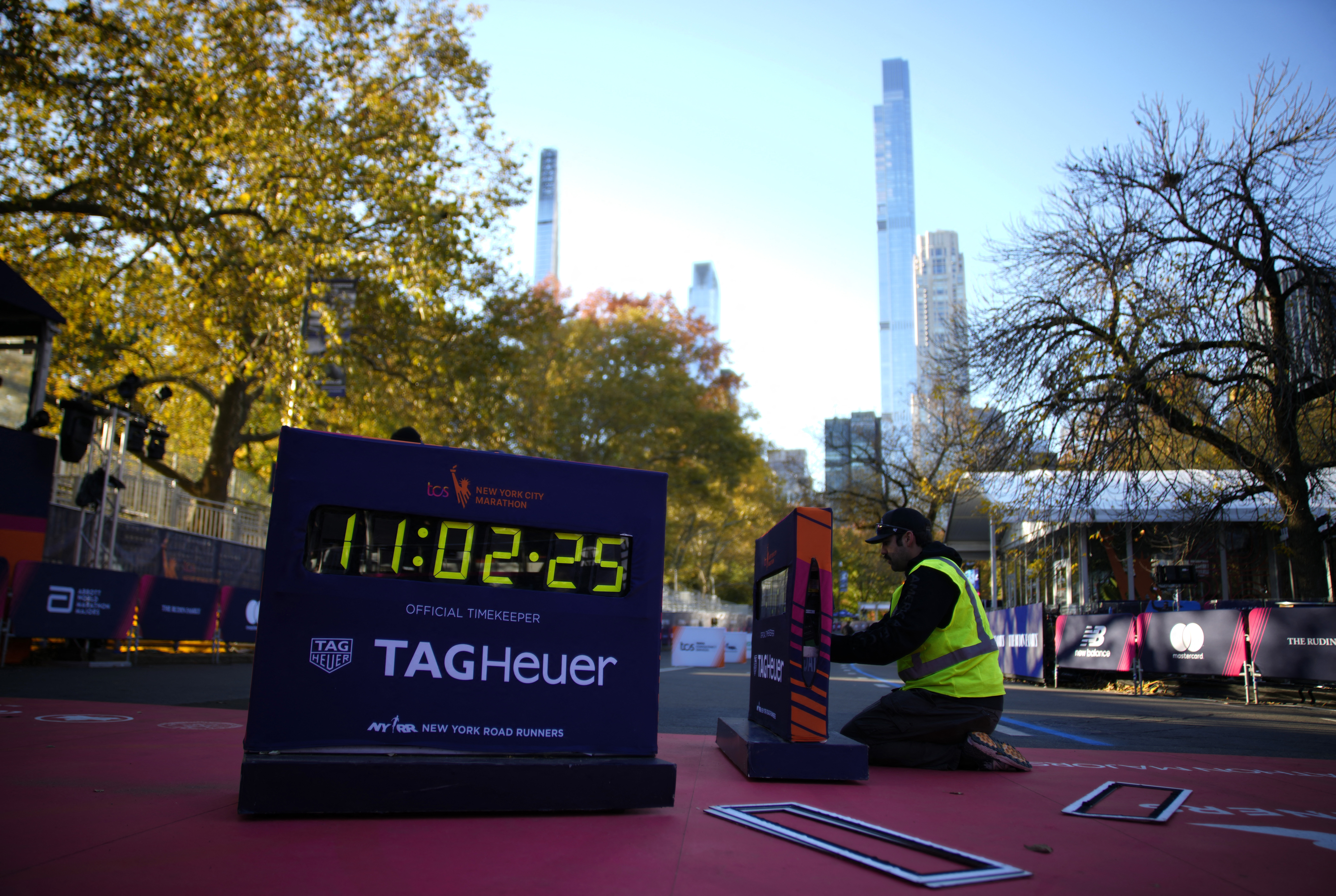 General view of a member of staff working on the finish line in Central Park in Manhattan before the marathon 