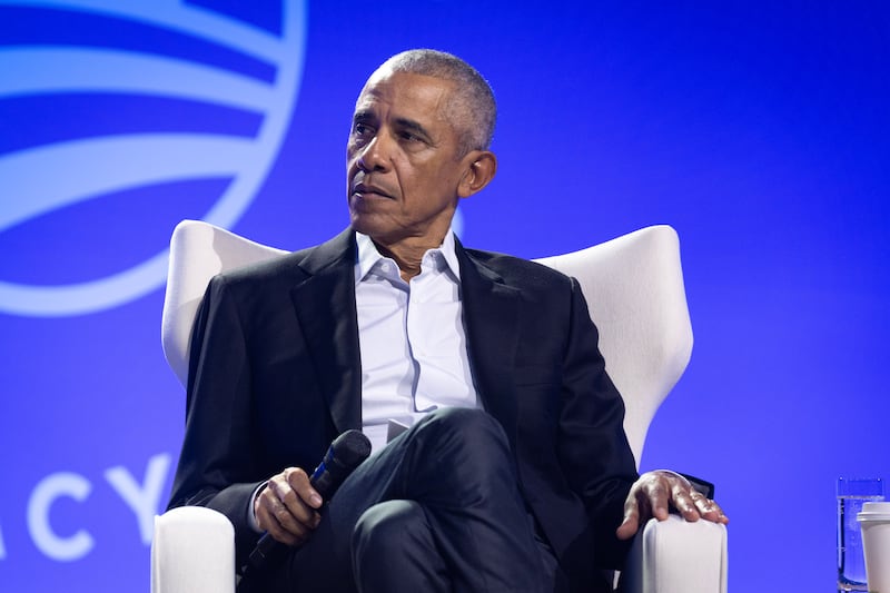 Former President Barack Obama moderates a conversation with Manu Meel, Co-Founder and CEO of BridgeUSA, Ainka Jackson, Founding executive director of the Selma Center for Nonviolence, Truth, and Reconciliation and Nika Kovač, Director of Slovenia-based Institute 8th of March during the Obama Foundation's 2024 Democracy Forum on December 05, 2024 in Chicago, Illinois.