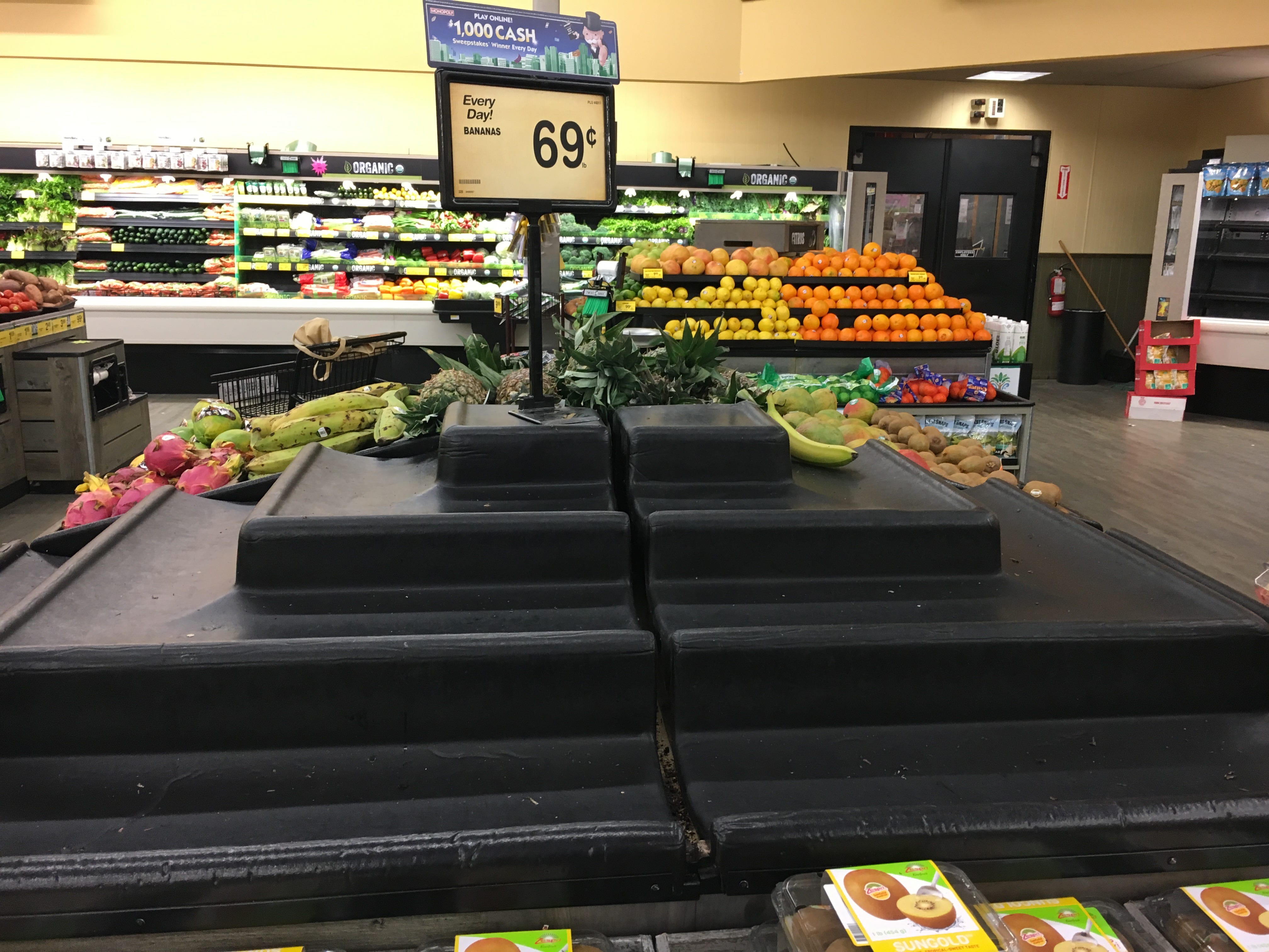 Empty produce display where bananas should be