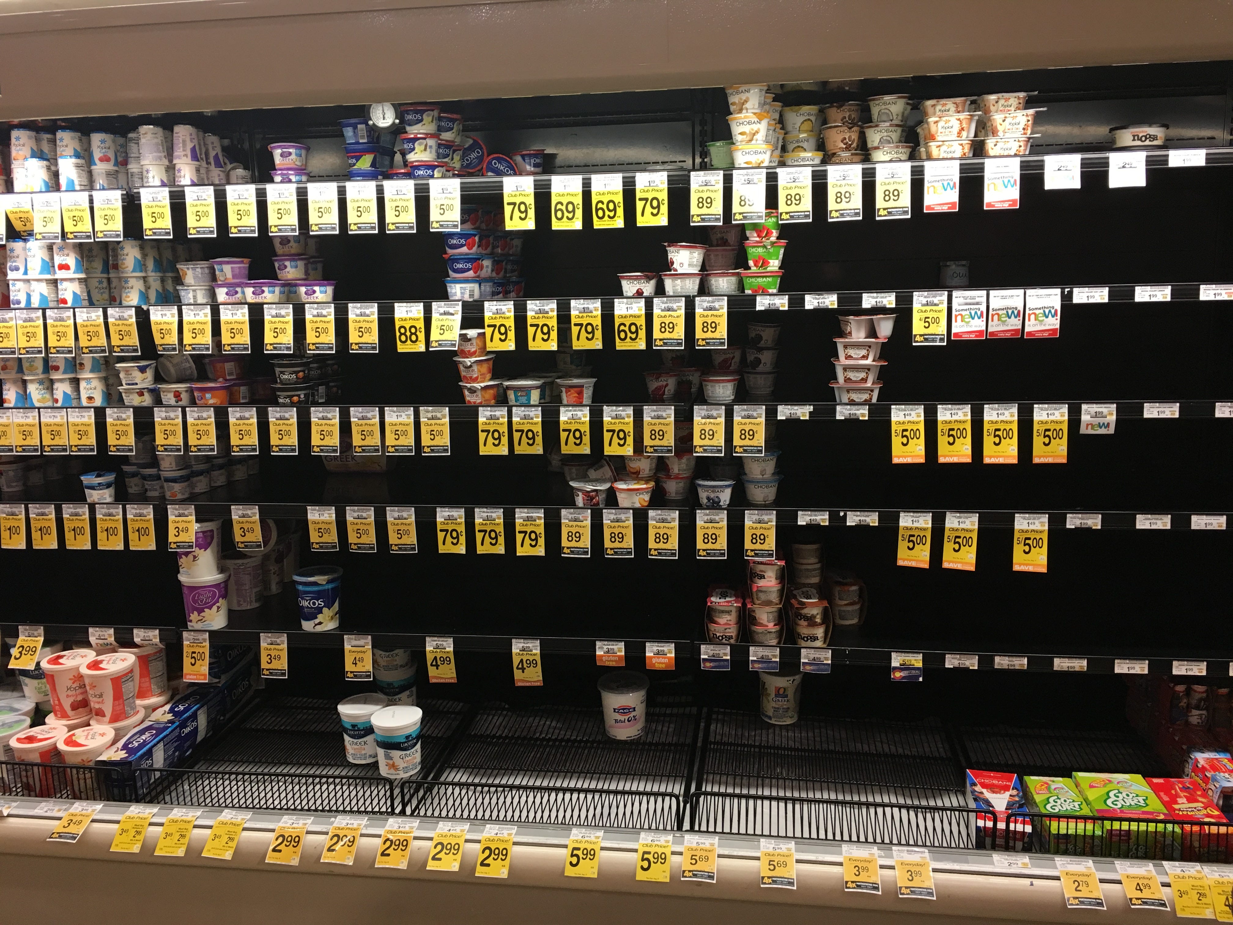 Yogurt aisle with many missing products