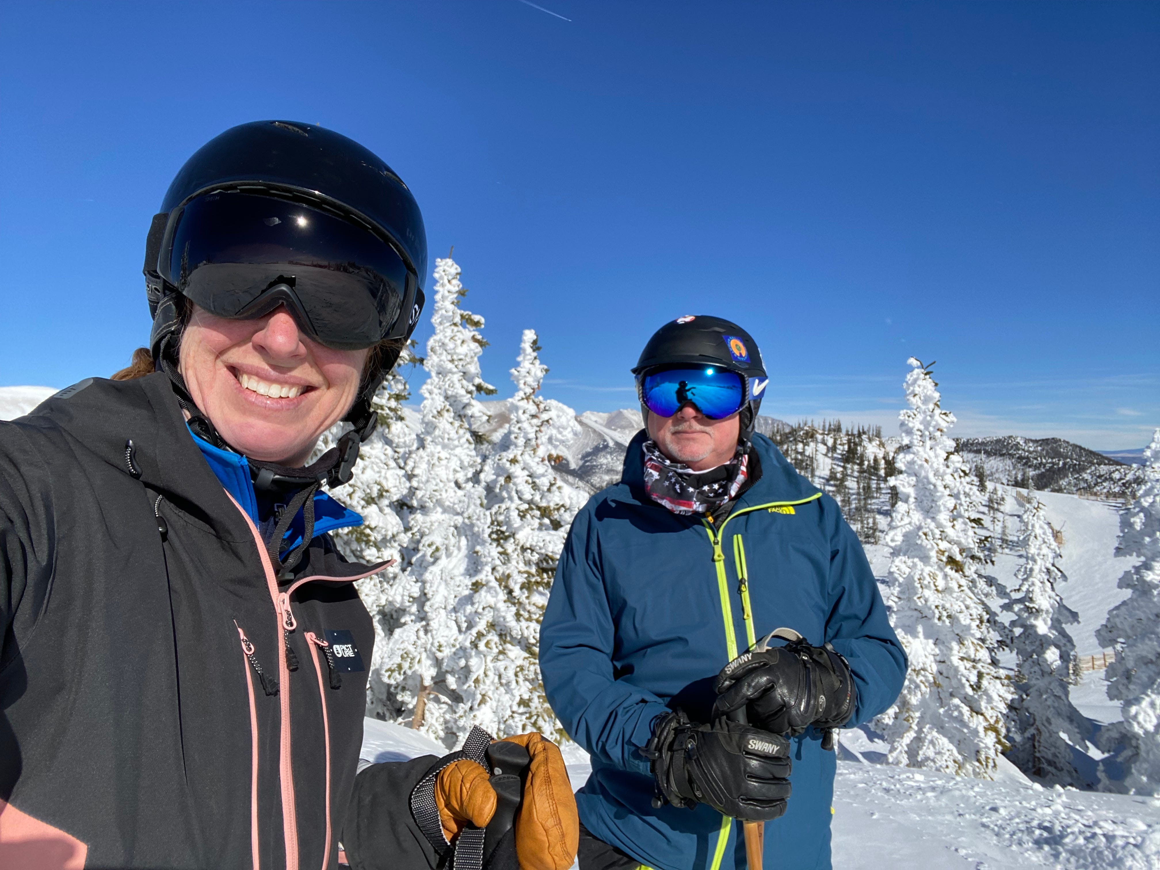 Author Becki Rupp and man in ski gear on snow-covered Monarch Mountain
