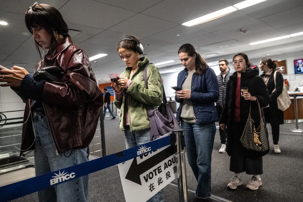 People waiting in line to vote in the mayoral election at Borough of Manhattan Community College.