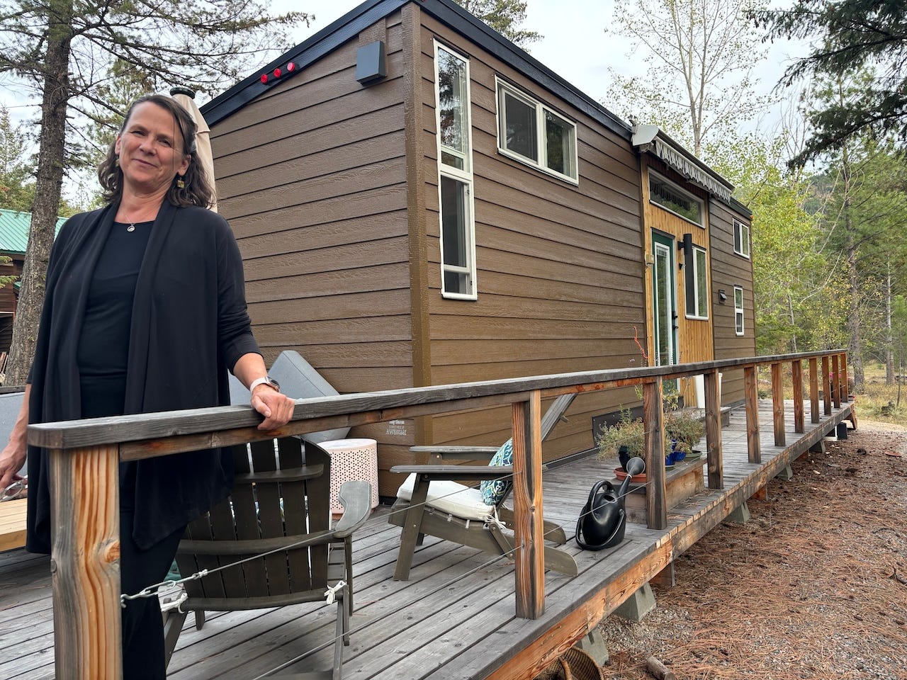 Julie Lennox outside her tiny home on wheels near Missoula, Montana.