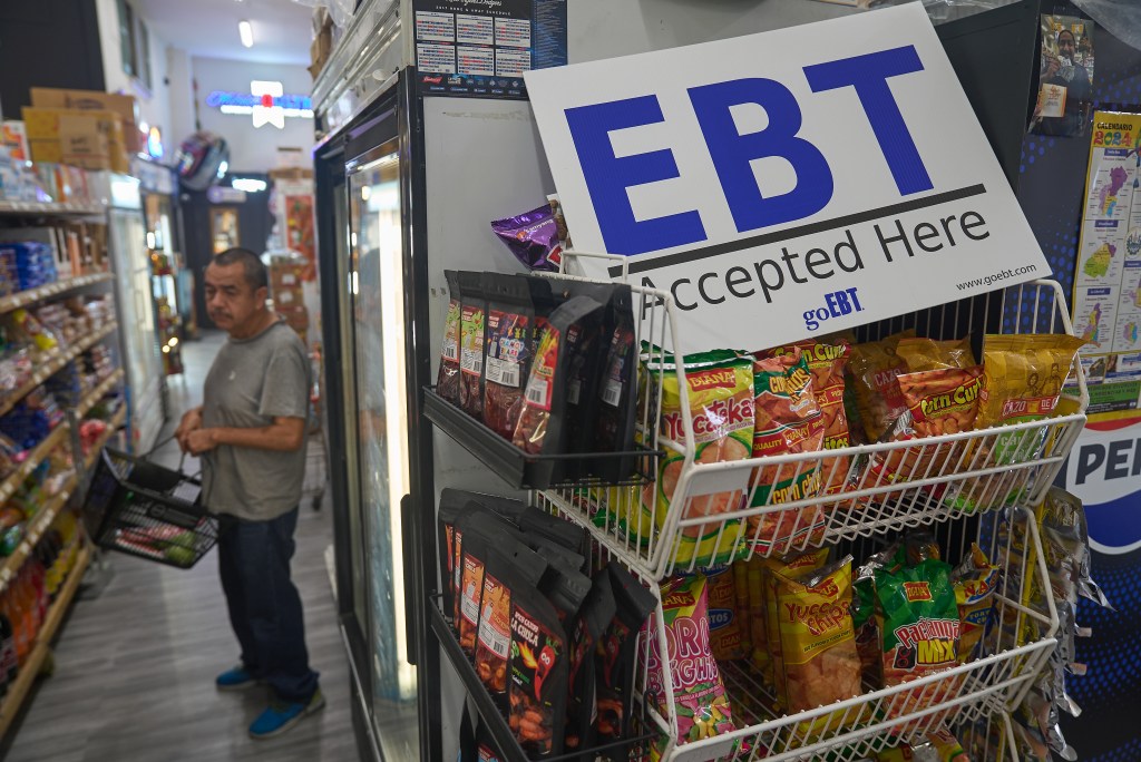 an EBT sign in a grocery store