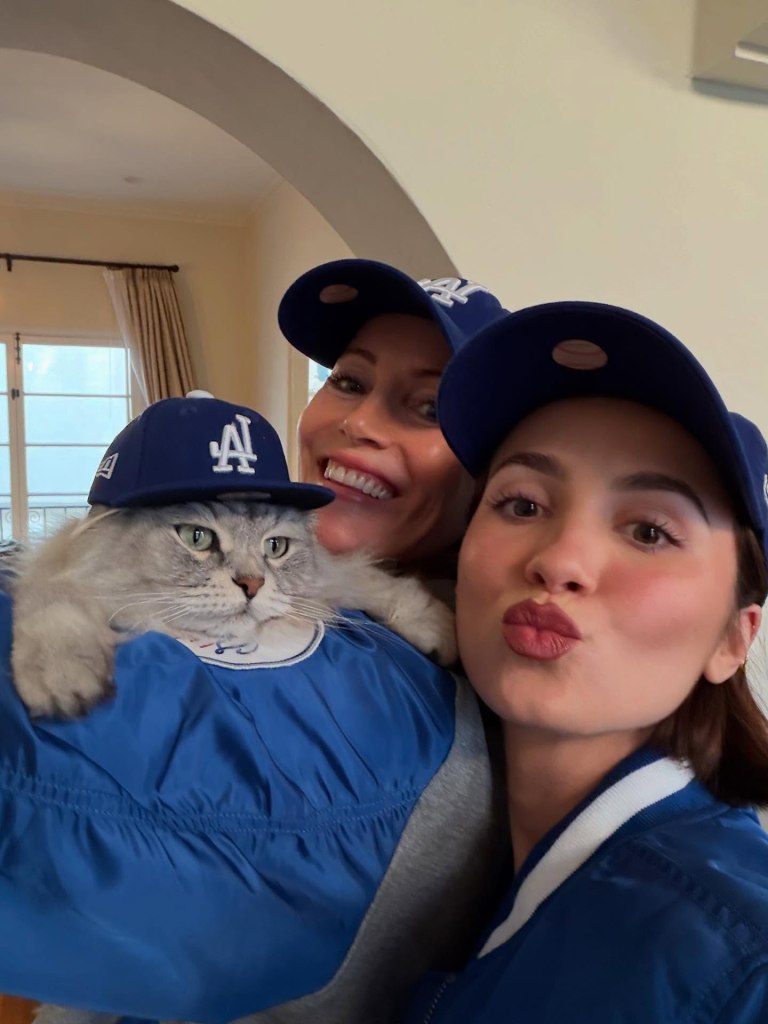Leslie Mann and Maude Apatow celebrate the Dodger's win. 