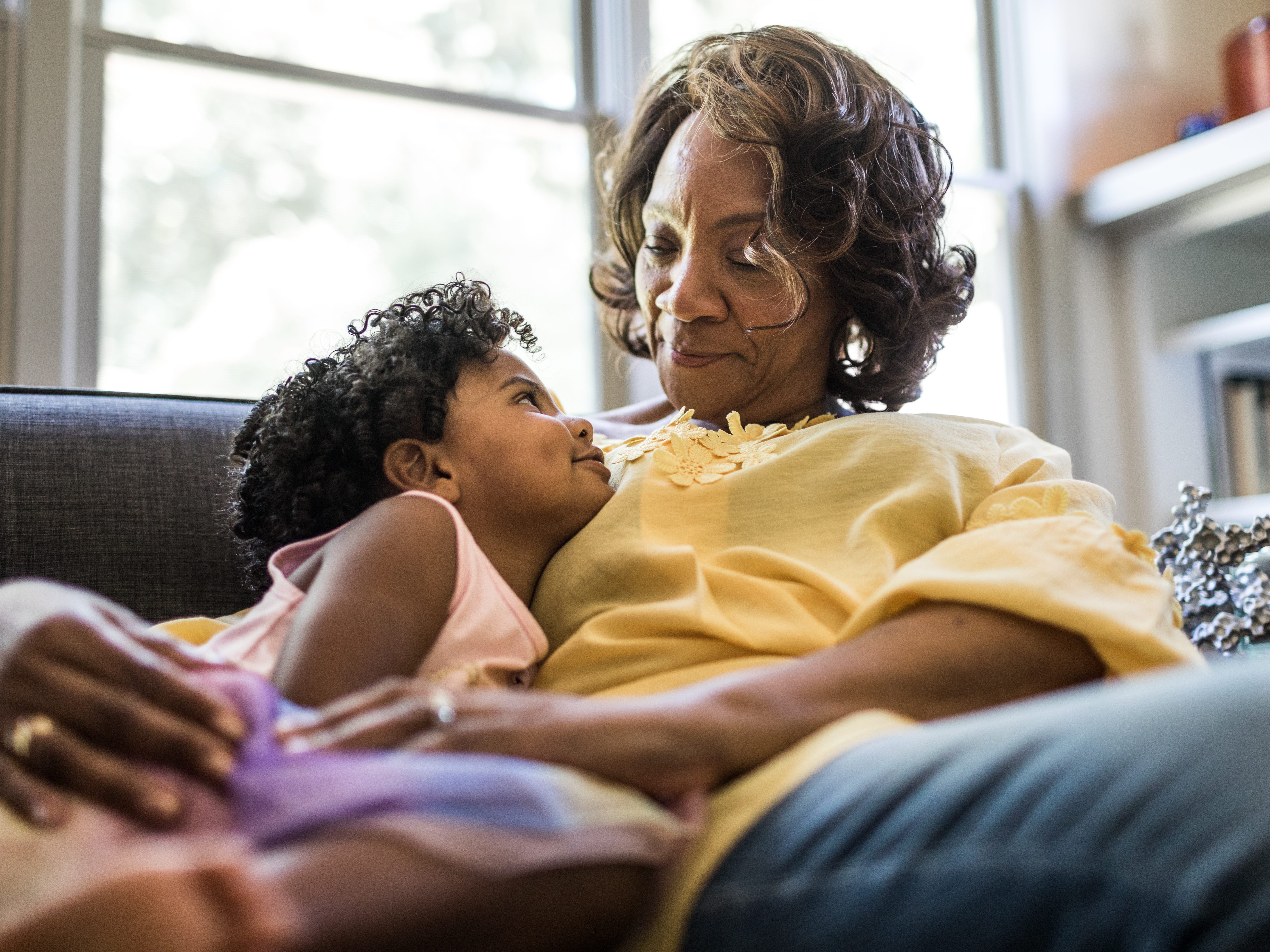 A grandmother with granddaughter.