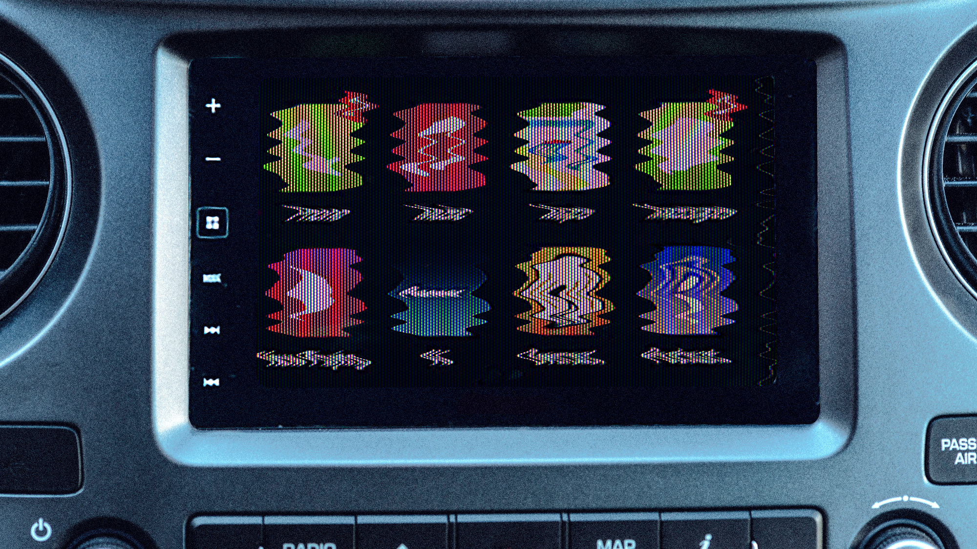 An image of a car touchscreen that is glitching.