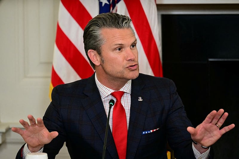 US Defense Secretary Pete Hegseth speaks during a law enforcement roundtable in the State Dining Room of the White House on October 23, 2025 in Washington, DC.