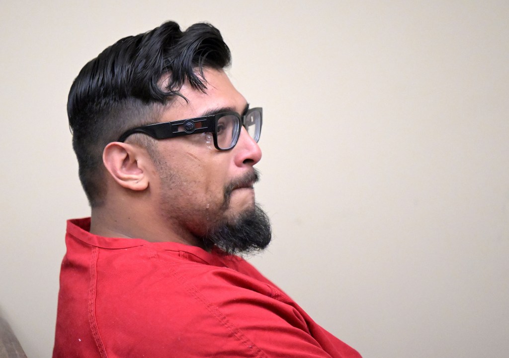 Jake Haro cries in court after pleading guilty to all charges, including second-degree murder of his 7-month-old son, Emmanuel.