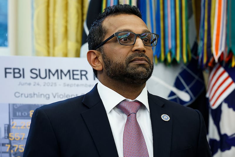 Federal Bureau of Investigation Director Kash Patel looks on as U.S. President Donald Trump speaks during a press conference in the Oval Office of the White House on October 15, 2025 in Washington, DC.