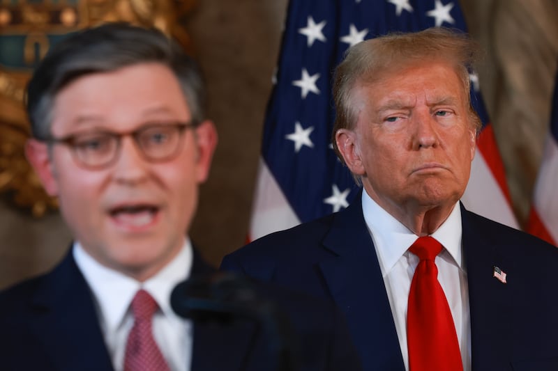 PALM BEACH, FLORIDA - APRIL 12: Republican presidential candidate former President Donald Trump listens as Speaker of the House Mike Johnson (R-LA) speaks during a press conference at Mr. Trump's Mar-a-Lago estate on April 12, 2024, in Palm Beach, Florida. They spoke about  