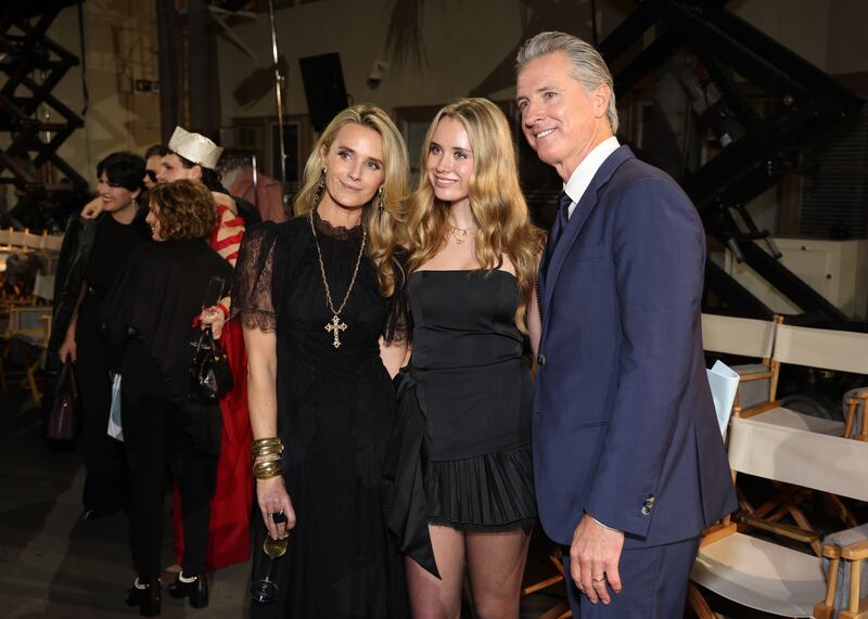 Jennifer Siebel Newsom, Montana Tessa Siebel Newsom, and Gavin Newsom attend Vogue World: Hollywood 2025 at Paramount Studios on October 26, 2025 in Los Angeles, California.