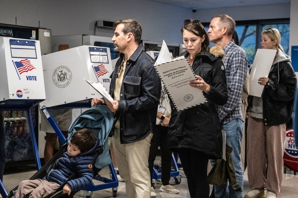 New Yorkers waiting in line to cast their ballots at a polling station at Borough of Manhattan Community College on Nov. 2, 2025.