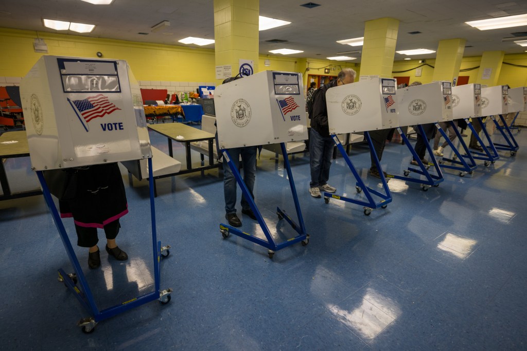 New Yorkers cast their ballots on the first day of in-person early voting for the next New York City mayor on October 25, 2025 in the borough of Manhattan.
