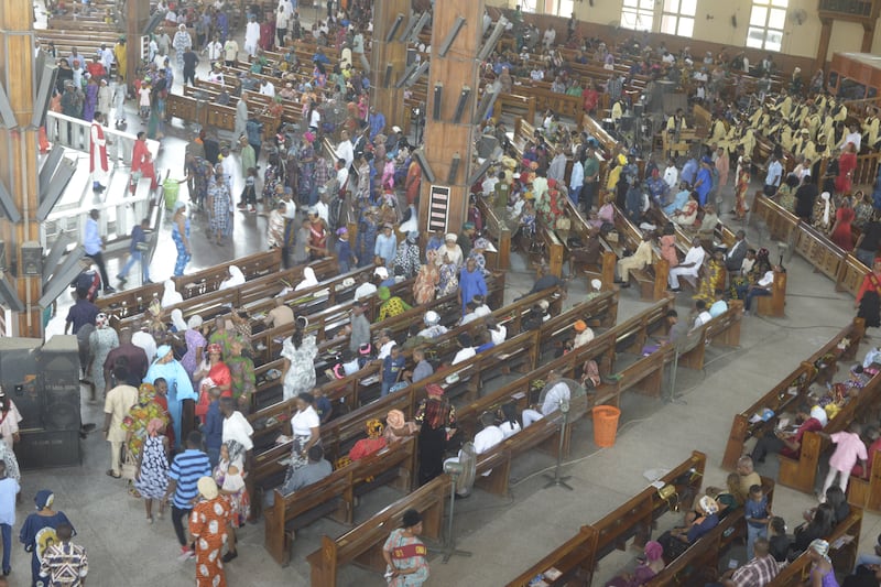 Members of St Leo Catholic Church participate in a service before holding a procession to mark Palm Sunday in Ikeja, Lagos, Nigeria, on April 13, 2025.