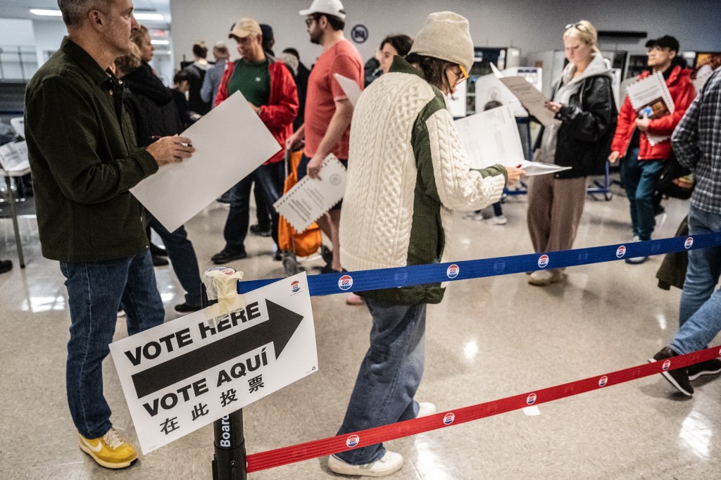 People voting in the mayoral election at Borough of Manhattan Community College.